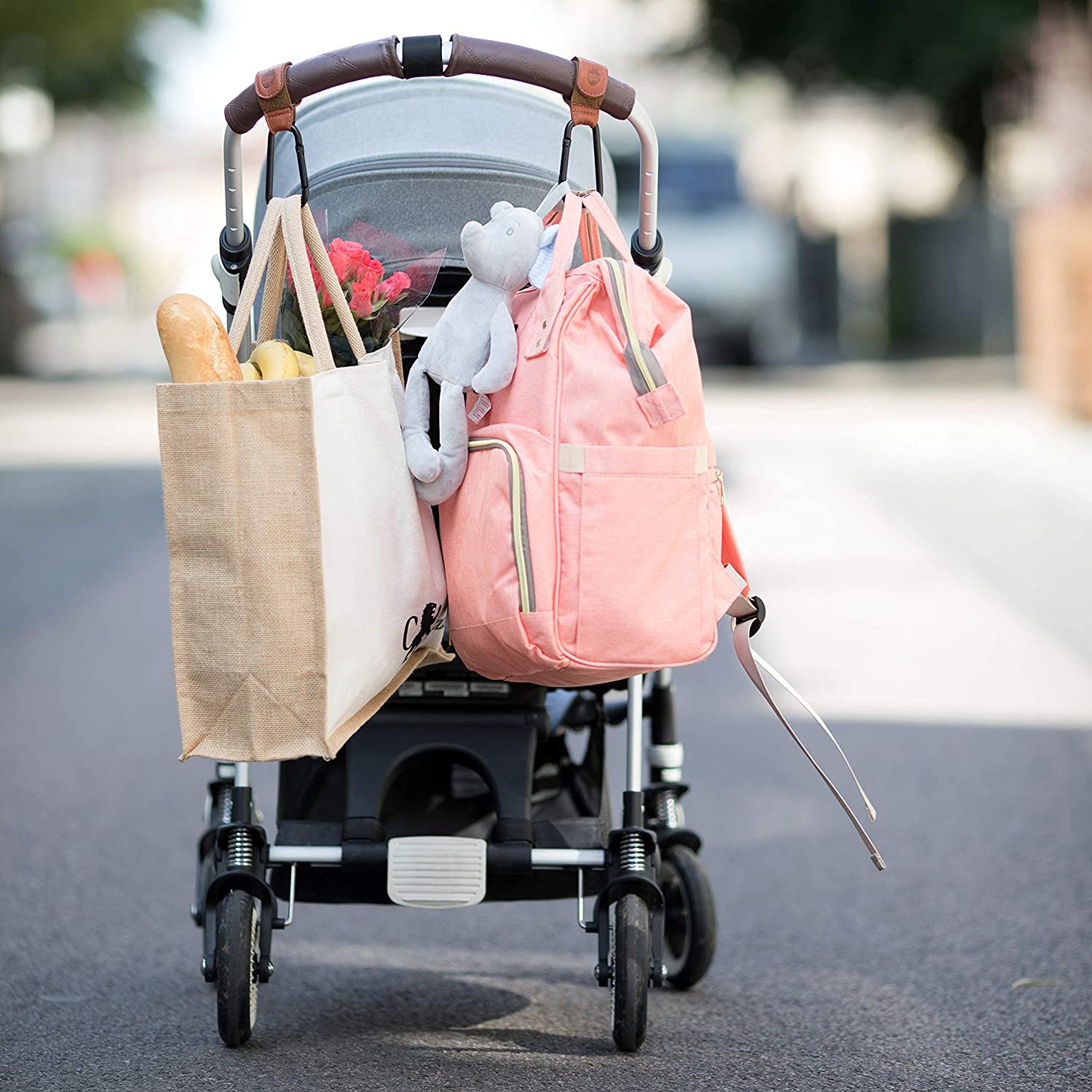 Diaper bag clips store for stroller